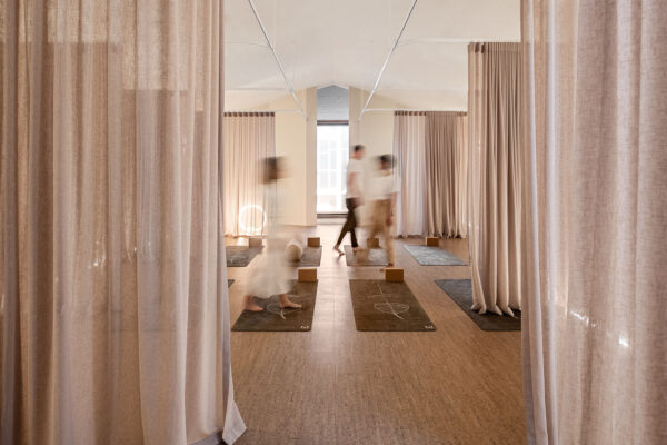 Mirosuna Melbourne yoga space with flowy curtains and soft ambient lighting to promote wellness through furnishings and design.